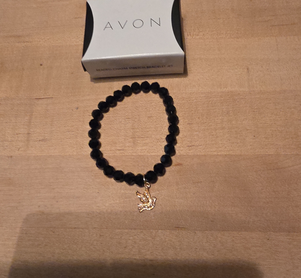 Avon Black Faceted Bead Bracelet with Gold Dove Charm